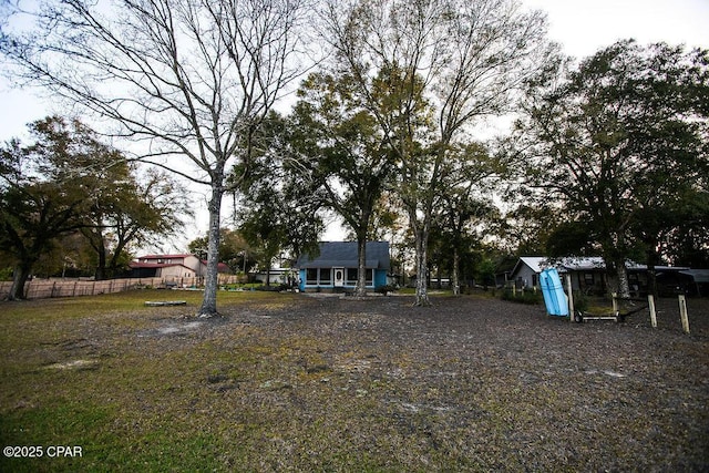 view of yard featuring fence