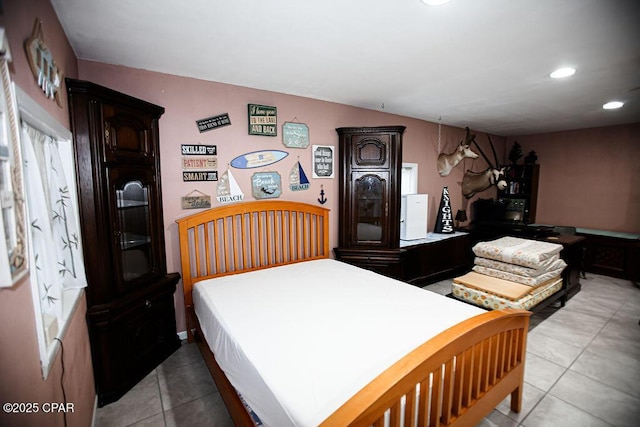 bedroom featuring tile patterned floors and recessed lighting