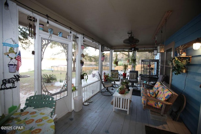 wooden terrace featuring ceiling fan