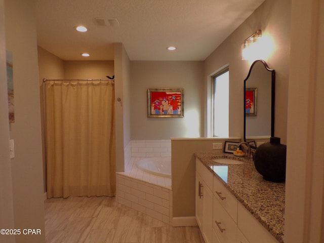 bathroom featuring vanity, a shower with shower curtain, visible vents, recessed lighting, and a bath