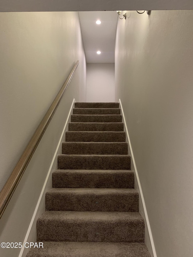 staircase featuring recessed lighting and baseboards