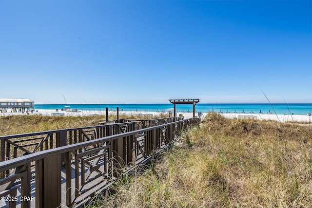 view of water feature with a beach view