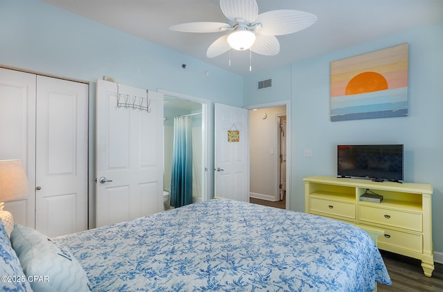 bedroom featuring a ceiling fan, visible vents, dark wood-style flooring, and baseboards