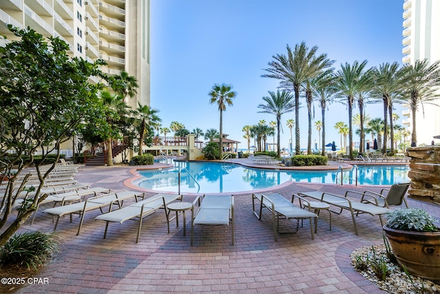 pool with a patio area