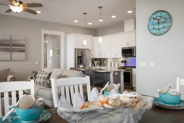 dining room featuring recessed lighting and a ceiling fan