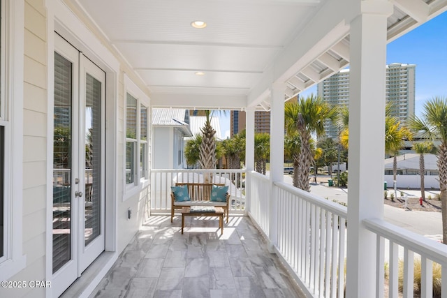 227 Sands St, Panama City Beach, FL 32413 - covered porch featuring french doors