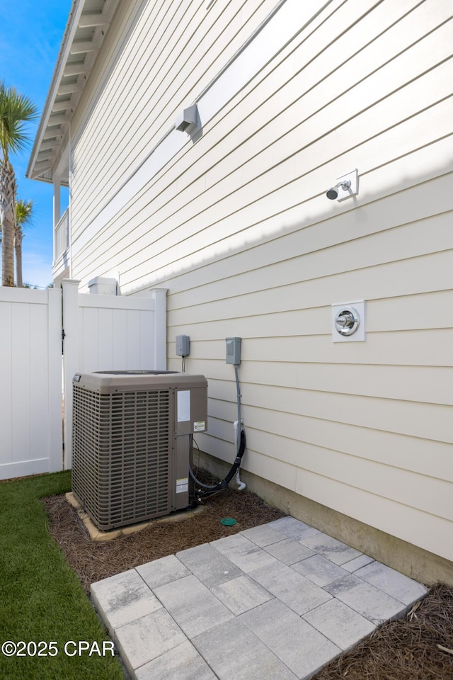 227 Sands St, Panama City Beach, FL 32413 - exterior view of a central AC unit
