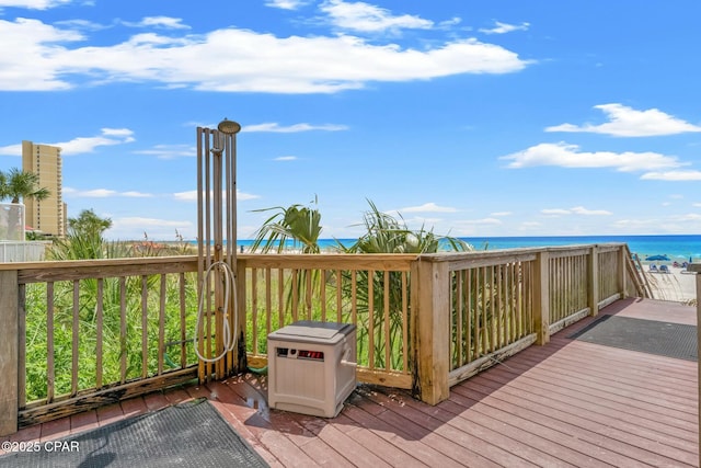 wooden deck with a water view