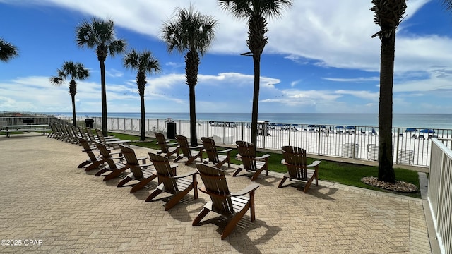 view of patio with a water view