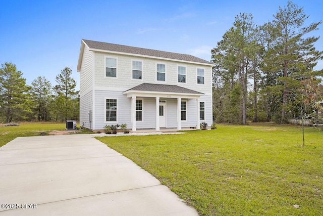 colonial home featuring driveway, a front yard, roof with shingles, central air condition unit, and a porch