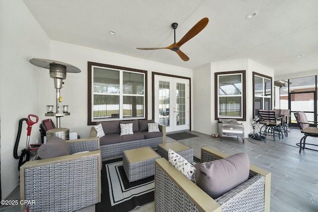 view of patio / terrace featuring outdoor lounge area, french doors, and ceiling fan