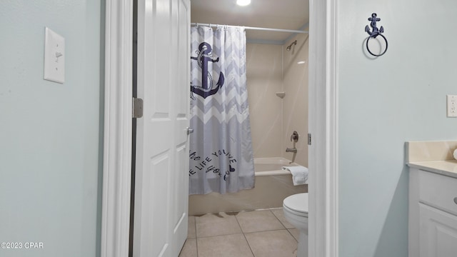 bathroom featuring vanity, tile patterned floors, toilet, and shower / bath combo