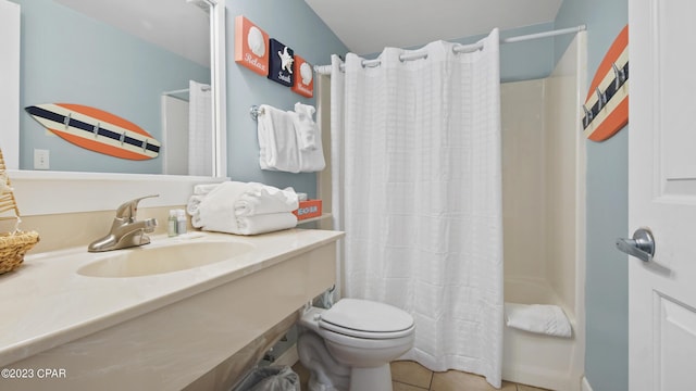 full bath with tile patterned flooring, toilet, vanity, and shower / bath combo with shower curtain