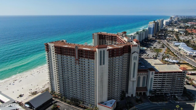 bird's eye view with a city view, a beach view, and a water view