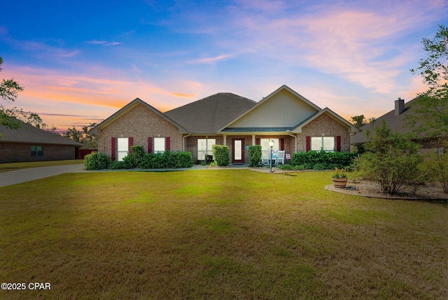 116 Lake Merial Blvd, Panama City, FL 32409 - view of front of property featuring a front yard and brick siding