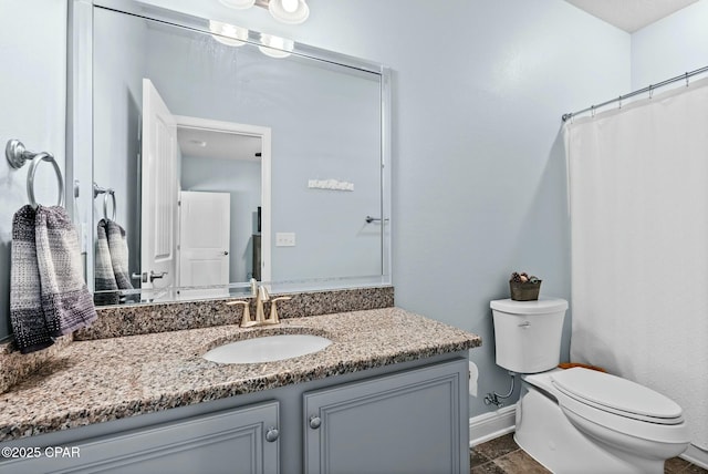 116 Lake Merial Blvd, Panama City, FL 32409 - bathroom with baseboards, toilet, and vanity