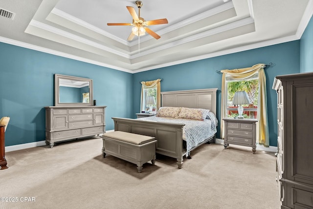 116 Lake Merial Blvd, Panama City, FL 32409 - bedroom featuring a raised ceiling, light colored carpet, crown molding, baseboards, and a ceiling fan
