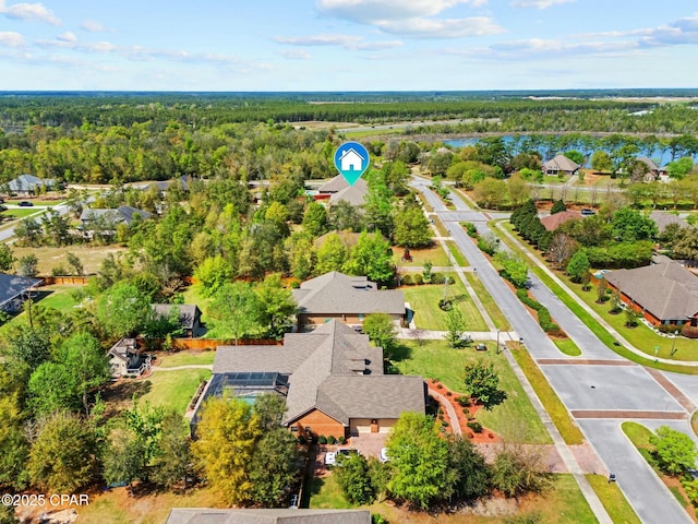116 Lake Merial Blvd, Panama City, FL 32409 - aerial view of residential area featuring a heavily wooded area and a large body of water