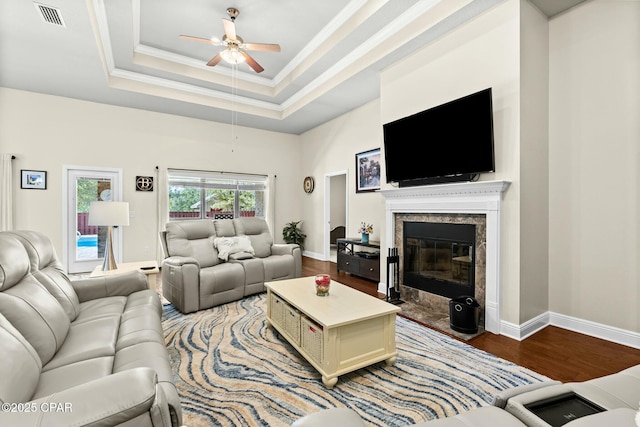 116 Lake Merial Blvd, Panama City, FL 32409 - living area with wood finished floors, ceiling fan, a premium fireplace, baseboards, and crown molding