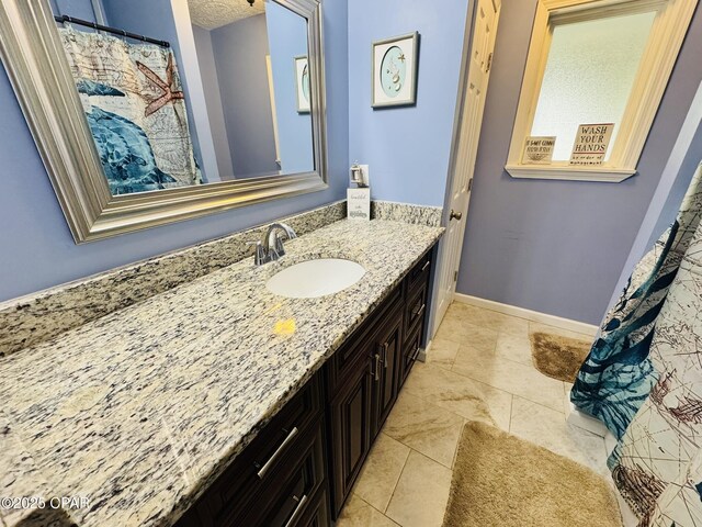 7224 Resota Ln, Panama City, FL 32409 - full bathroom with vanity and baseboards