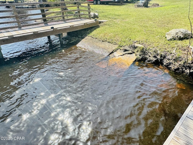 7224 Resota Ln, Panama City, FL 32409 - view of dock featuring a yard and a water view