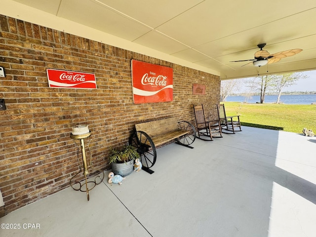 7224 Resota Ln, Panama City, FL 32409 - view of patio featuring ceiling fan and a water view