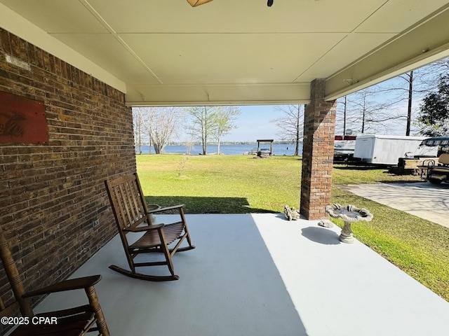 7224 Resota Ln, Panama City, FL 32409 - view of patio featuring a water view
