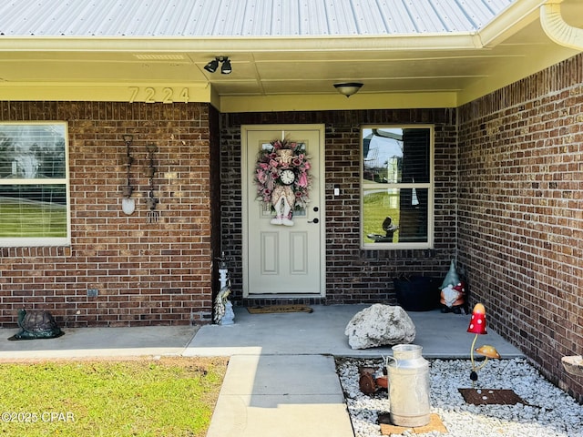 7224 Resota Ln, Panama City, FL 32409 - property entrance with brick siding and metal roof