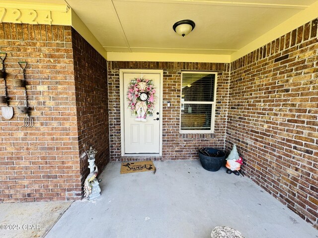 7224 Resota Ln, Panama City, FL 32409 - view of exterior entry with brick siding