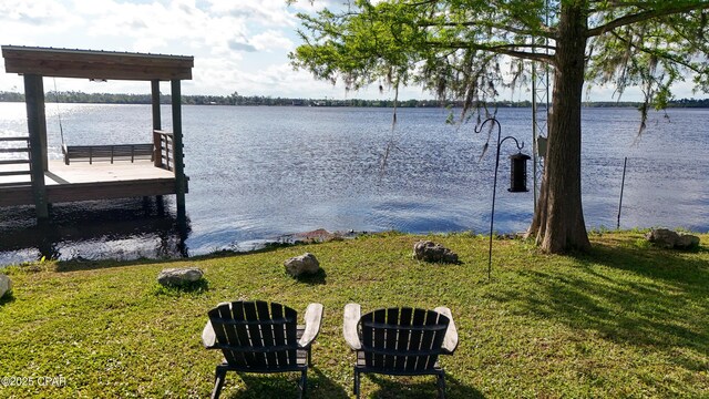 7224 Resota Ln, Panama City, FL 32409 - dock area featuring a water view and a yard
