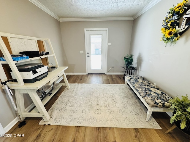 7224 Resota Ln, Panama City, FL 32409 - entrance foyer featuring ornamental molding, a textured ceiling, baseboards, and wood finished floors
