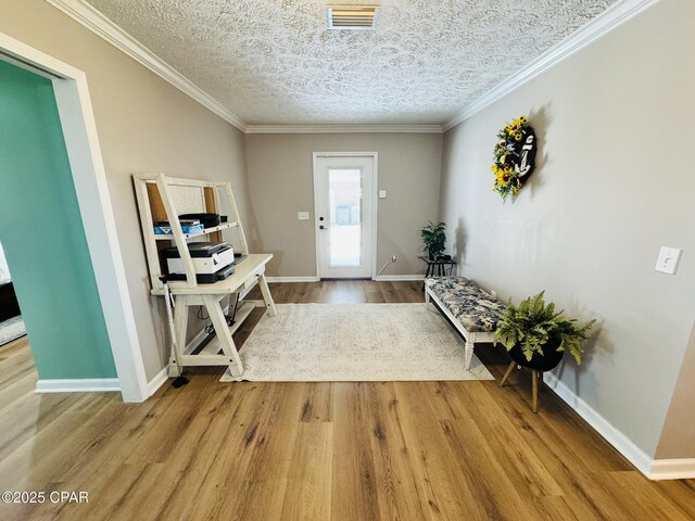 7224 Resota Ln, Panama City, FL 32409 - foyer entrance with visible vents, wood finished floors, and baseboards