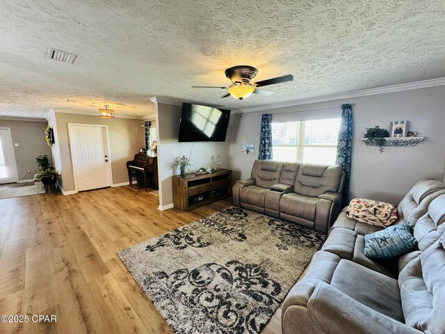 7224 Resota Ln, Panama City, FL 32409 - living area with a wealth of natural light, ornamental molding, and visible vents
