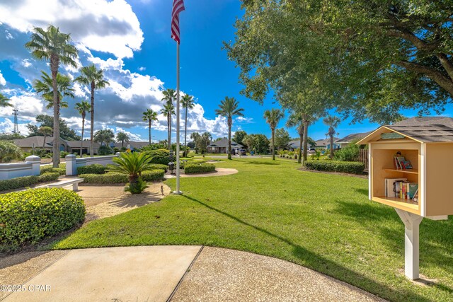 107 Summerwood Dr, Panama City Beach, FL 32413 - view of green lawn featuring a residential view