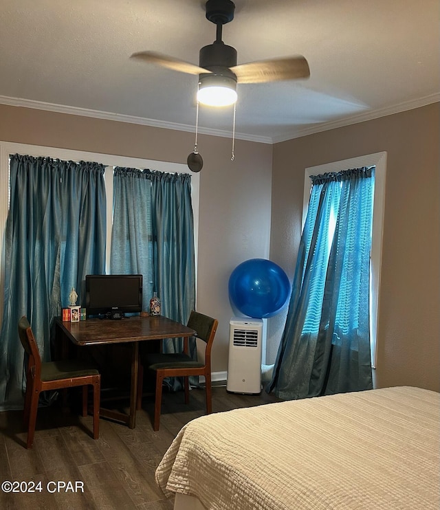 603 W Kansas Ave, Bonifay, FL 32425 - bedroom with crown molding, ceiling fan, and wood finished floors