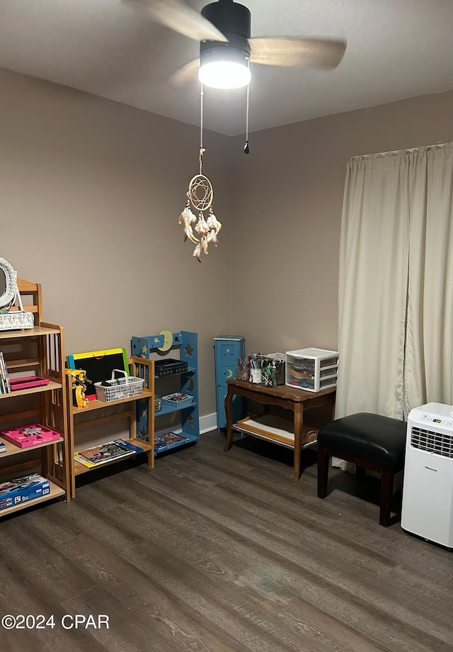 603 W Kansas Ave, Bonifay, FL 32425 - recreation room with wood finished floors and ceiling fan with notable chandelier