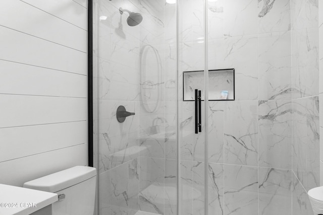 5408 Lagoon Way Unit 5, Panama City, FL 32408 - full bath featuring vanity, toilet, and a marble finish shower