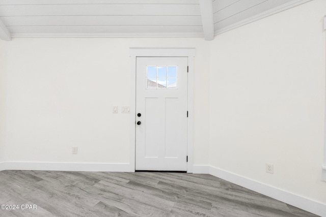 5408 Lagoon Way Unit 5, Panama City, FL 32408 - foyer entrance with light wood-style flooring, baseboards, and ornamental molding