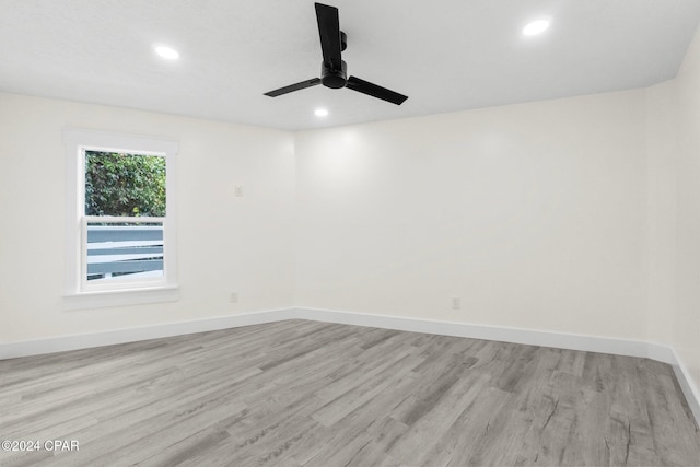 5408 Lagoon Way Unit 5, Panama City, FL 32408 - empty room with a ceiling fan, recessed lighting, baseboards, and light wood-type flooring