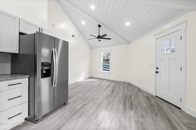 5408 Lagoon Way Unit 5, Panama City, FL 32408 - kitchen with beamed ceiling, stainless steel fridge, light wood finished floors, baseboards, and ceiling fan