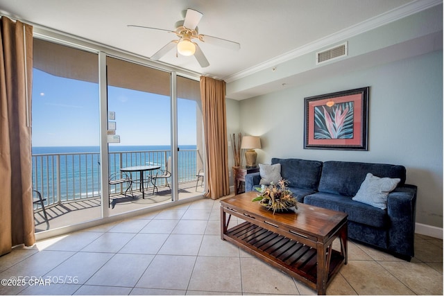 16819 Front Beach Rd Unit 716, Panama City Beach, FL 32413 - tiled living area featuring a ceiling fan, floor to ceiling windows, ornamental molding, visible vents, and a water view