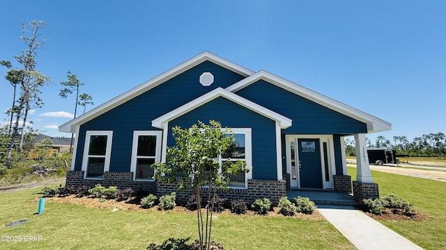 1209 Seafoam St, Panama City, FL 32404 - view of front of property featuring brick siding