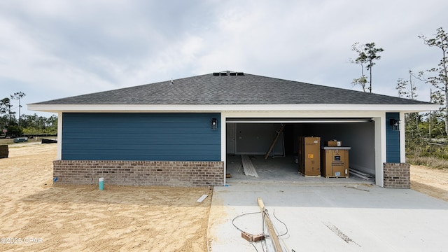 1209 Seafoam St, Panama City, FL 32404 - view of side of property featuring brick siding, an outdoor structure, and a shed