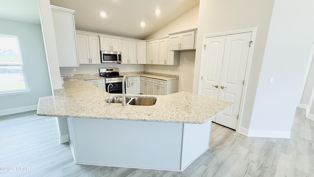 1209 Seafoam St, Panama City, FL 32404 - full bathroom with wood finished floors, toilet, vanity, and washtub / shower combination
