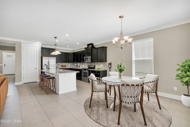 117 Cedar Hammock Ln, Panama City Beach, FL 32407 - dining room with a chandelier, crown molding, light tile patterned flooring, baseboards, and recessed lighting
