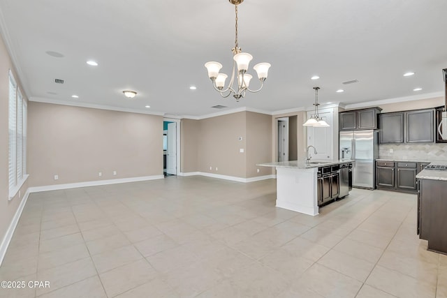 117 Cedar Hammock Ln, Panama City Beach, FL 32407 - kitchen featuring appliances with stainless steel finishes, crown molding, recessed lighting, decorative backsplash, and open floor plan