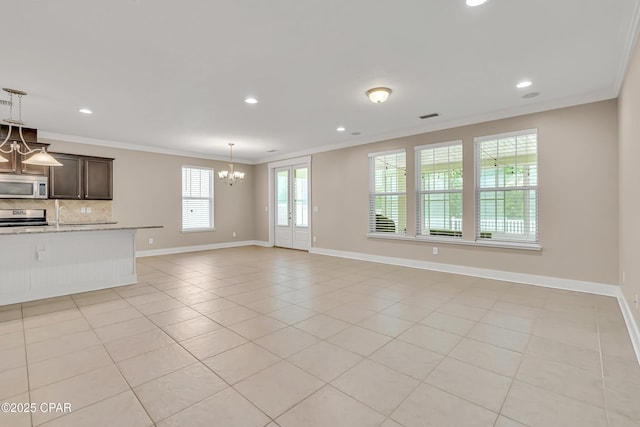 117 Cedar Hammock Ln, Panama City Beach, FL 32407 - unfurnished living room with crown molding, a chandelier, light tile patterned flooring, baseboards, and recessed lighting