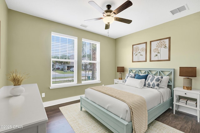 117 Cedar Hammock Ln, Panama City Beach, FL 32407 - bedroom with dark wood-type flooring, baseboards, and a ceiling fan