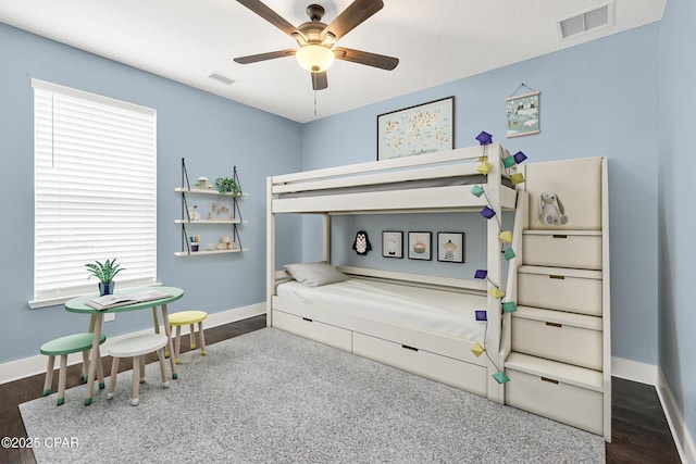 117 Cedar Hammock Ln, Panama City Beach, FL 32407 - bedroom with wood finished floors, baseboards, and ceiling fan