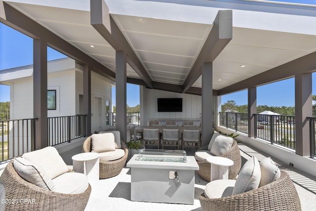 17 Woodland Dr, Santa Rosa Beach, FL 32459 - view of patio featuring an outdoor living space with a fire pit